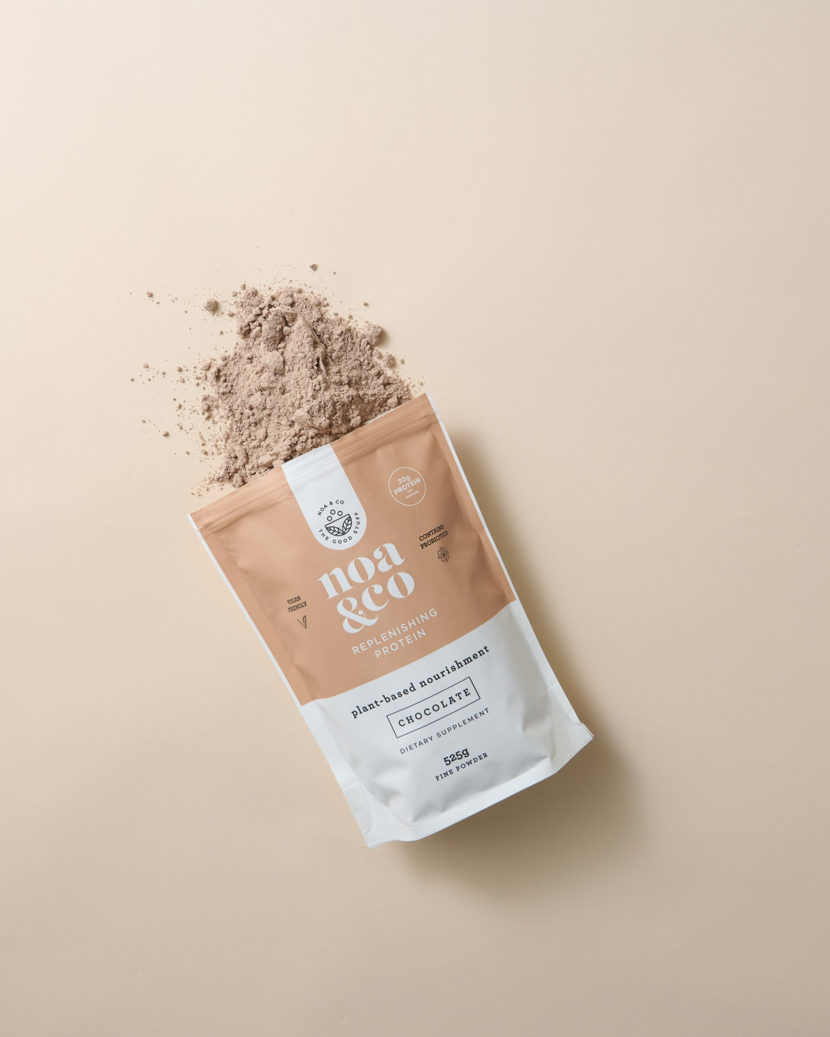 Noa & Co Chocolate Replenishing Protein pouch, with powder pouring out