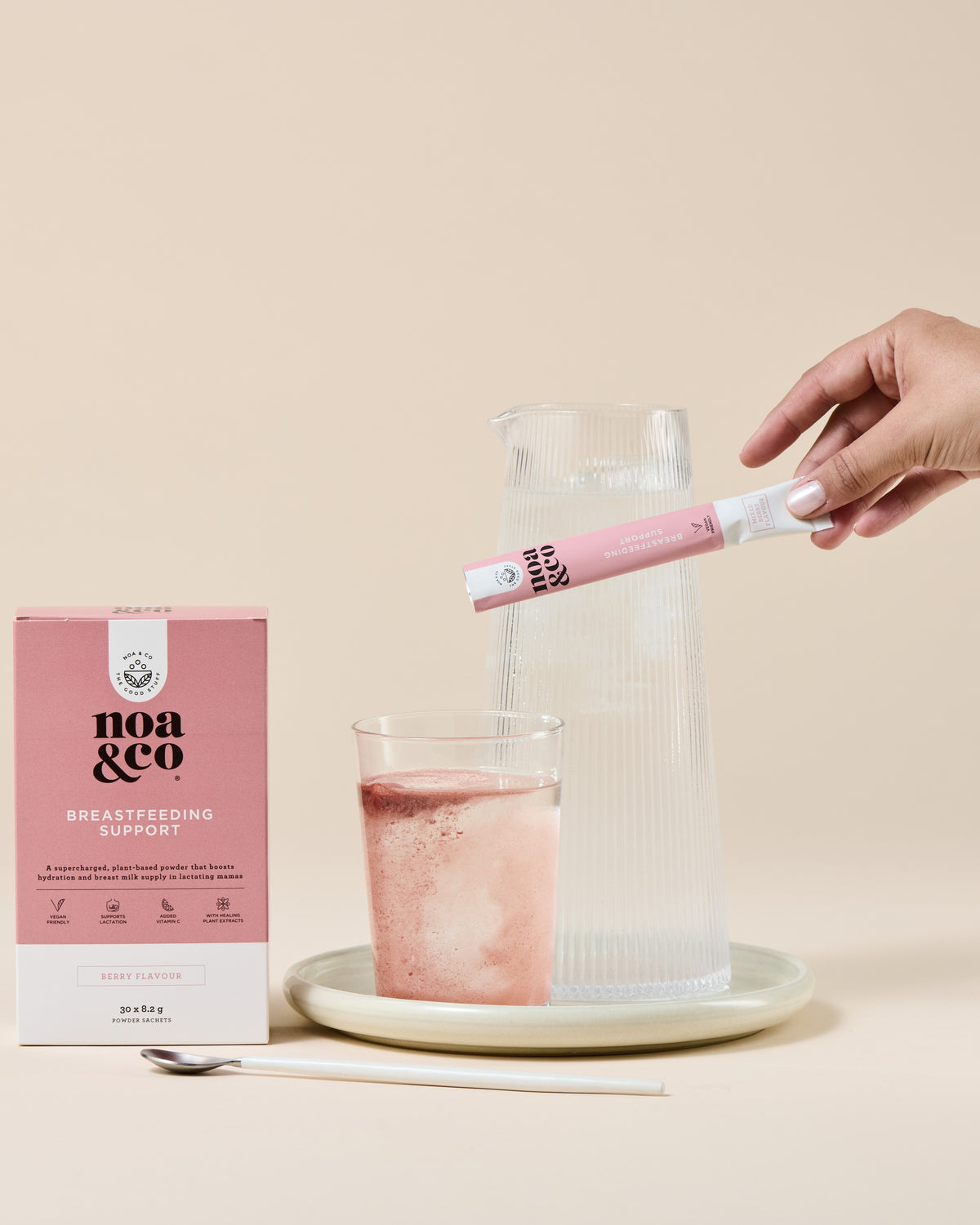 Noa & Co Breastfeeding Support 30 sachets box, with sachet being poured into water