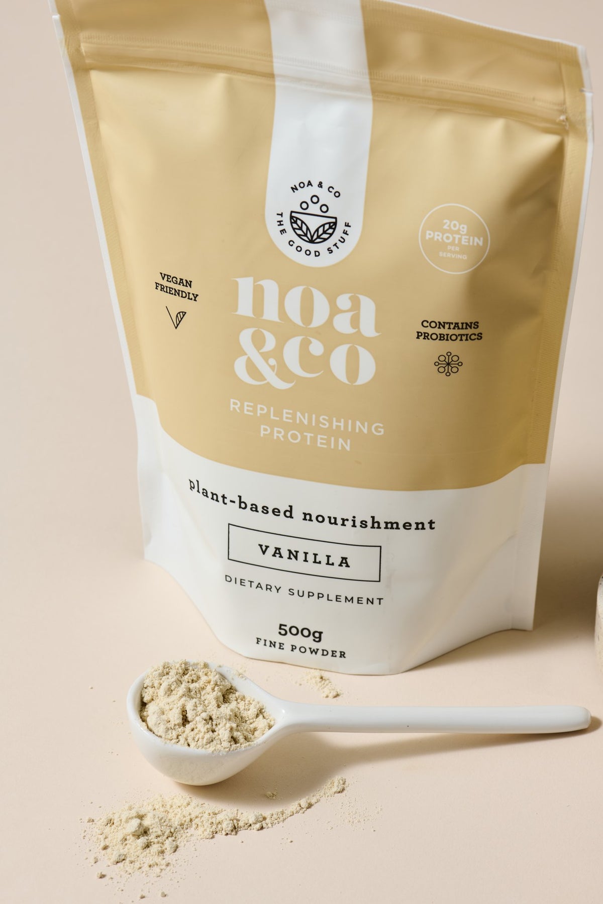Vanilla Replenishing Protein with a scoop of powder