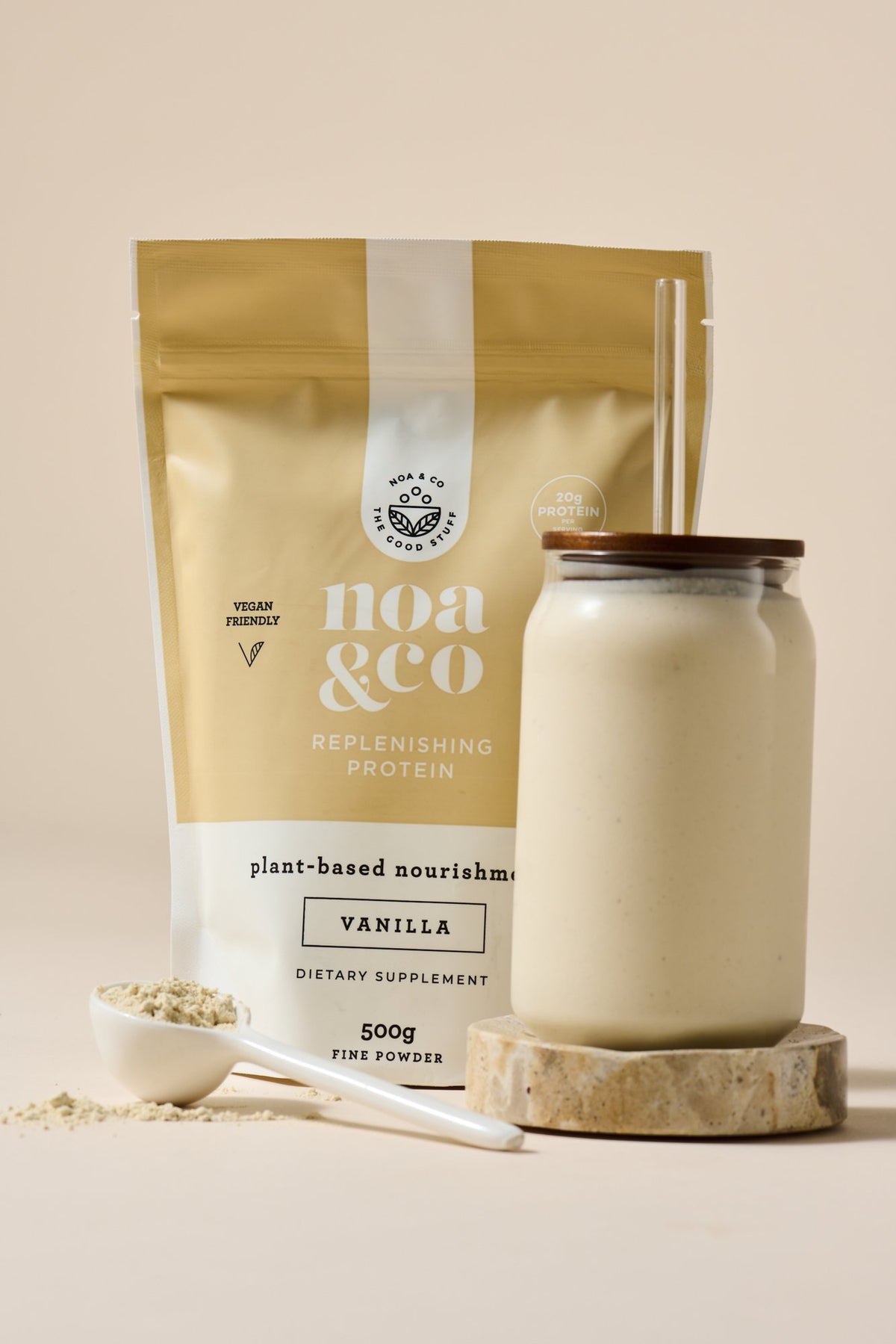 Vanilla Replenishing Protein with a scoop and a smoothie