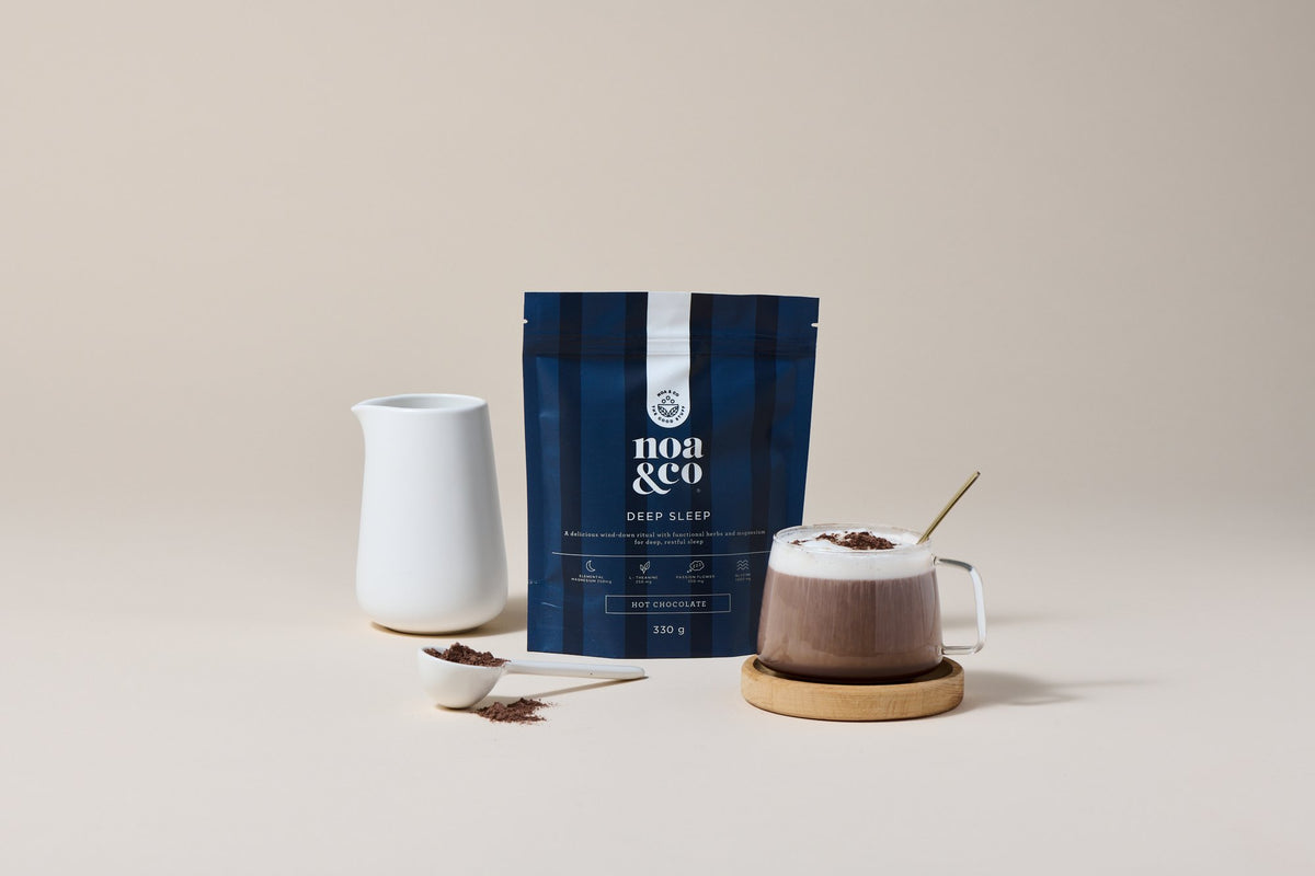 Deep Sleep Hot Chocolate with a mug and a milk jug