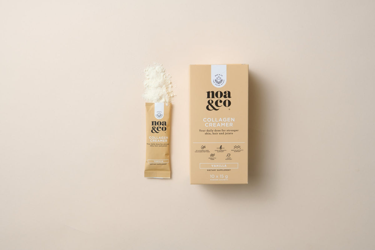 Collagen Creamer sachet box and a sachet of powder
