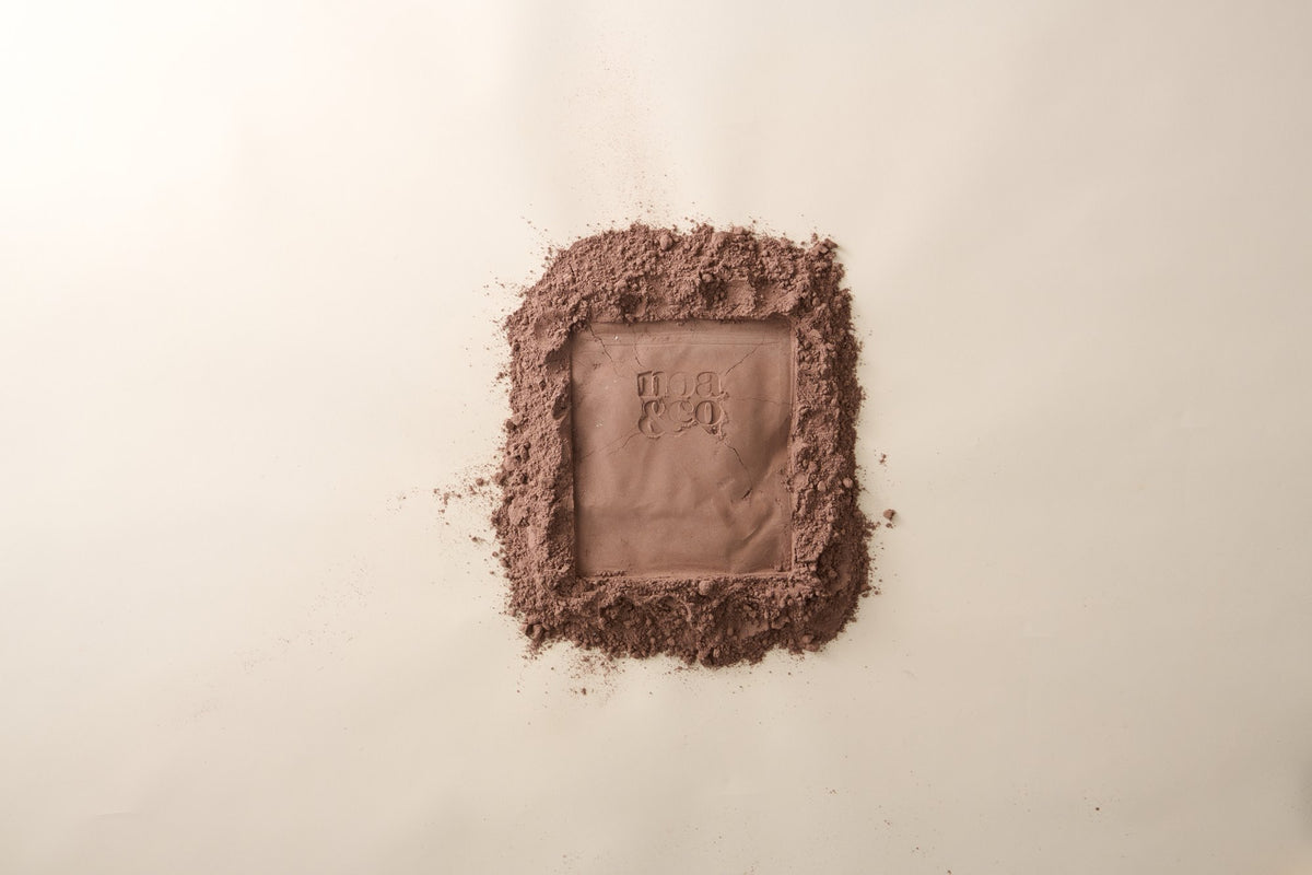 Noa & Co logo pressed into hot chocolate powder